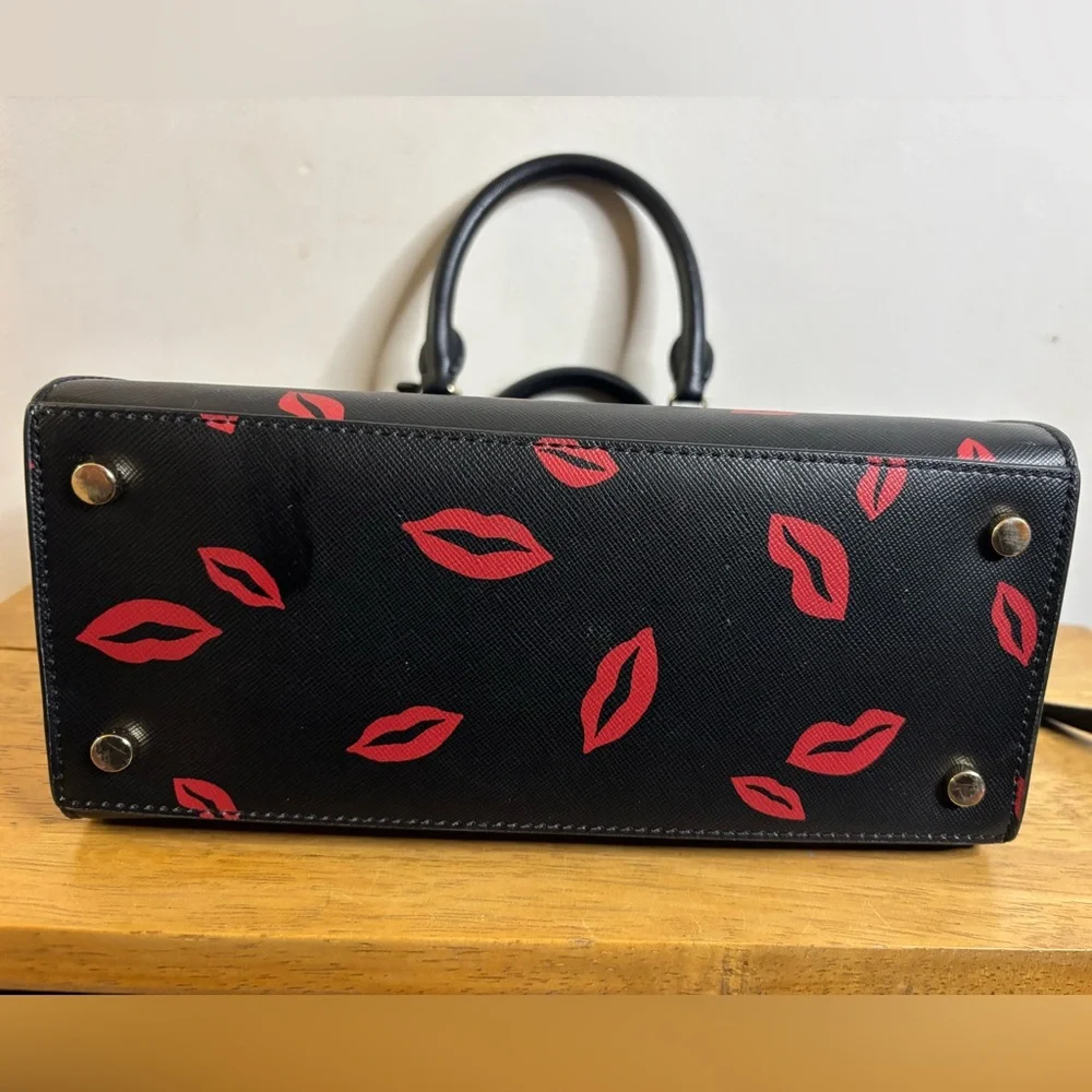 Kate Spade New York Madison Lip Toss small satchel in black saffiano leather